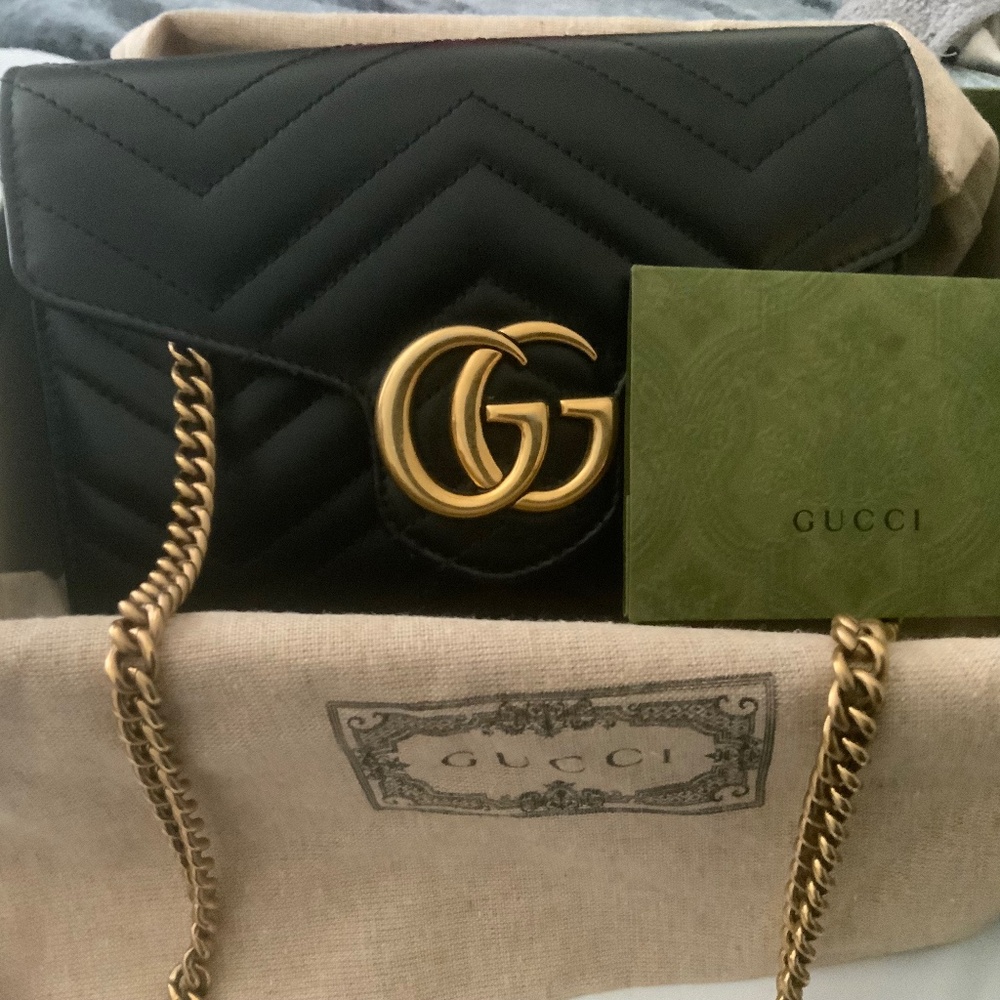 Authentic Gucci crossbody bag with GG logo